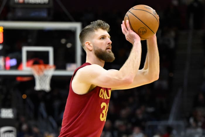 Nov 19, 2023; Cleveland, Ohio, USA; Cleveland Cavaliers forward Dean Wade (32) shoots in the fourth quarter against the Denver Nuggets at Rocket Mortgage FieldHouse.